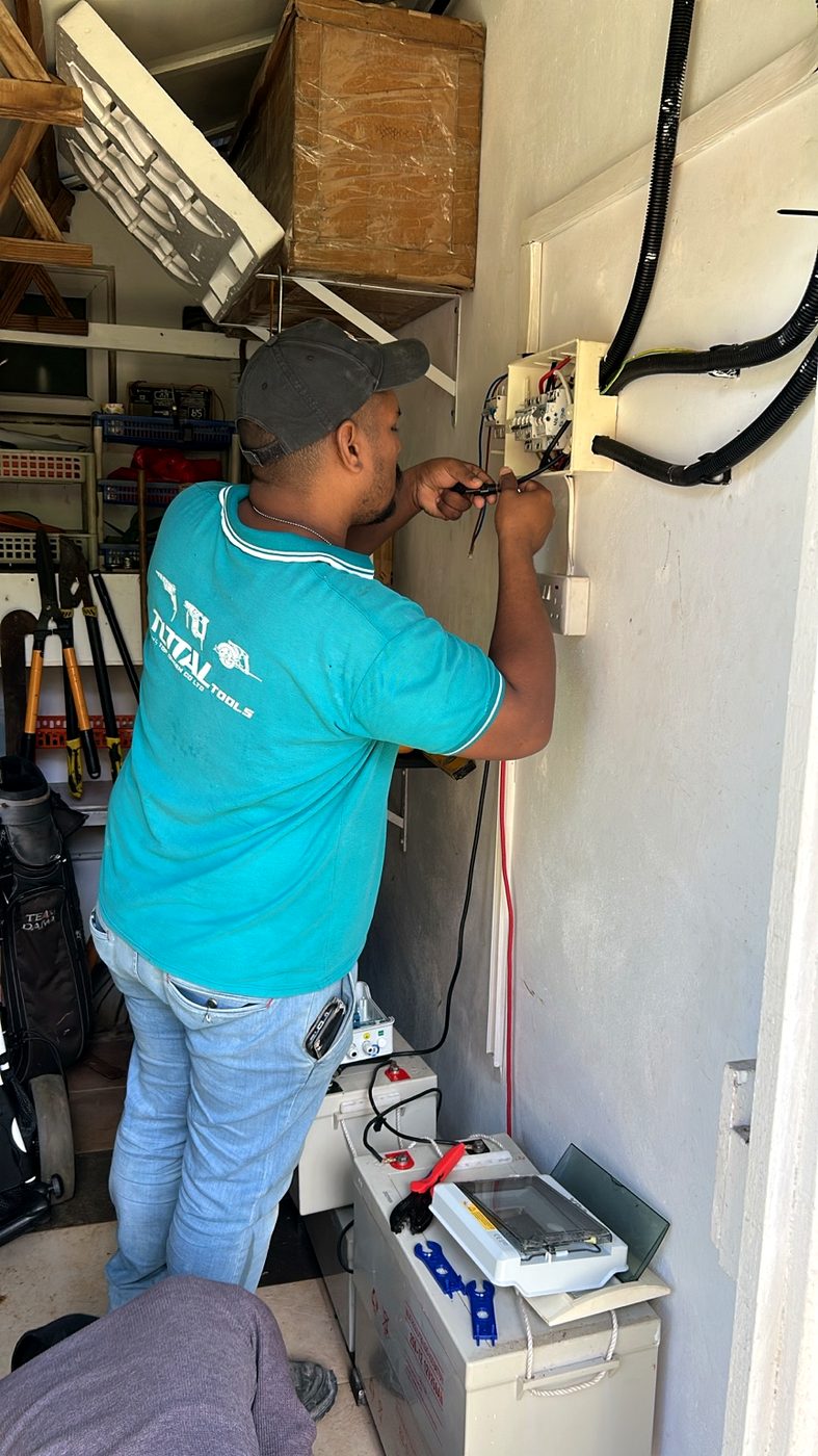 Crossfield technician carrying out electrical works
